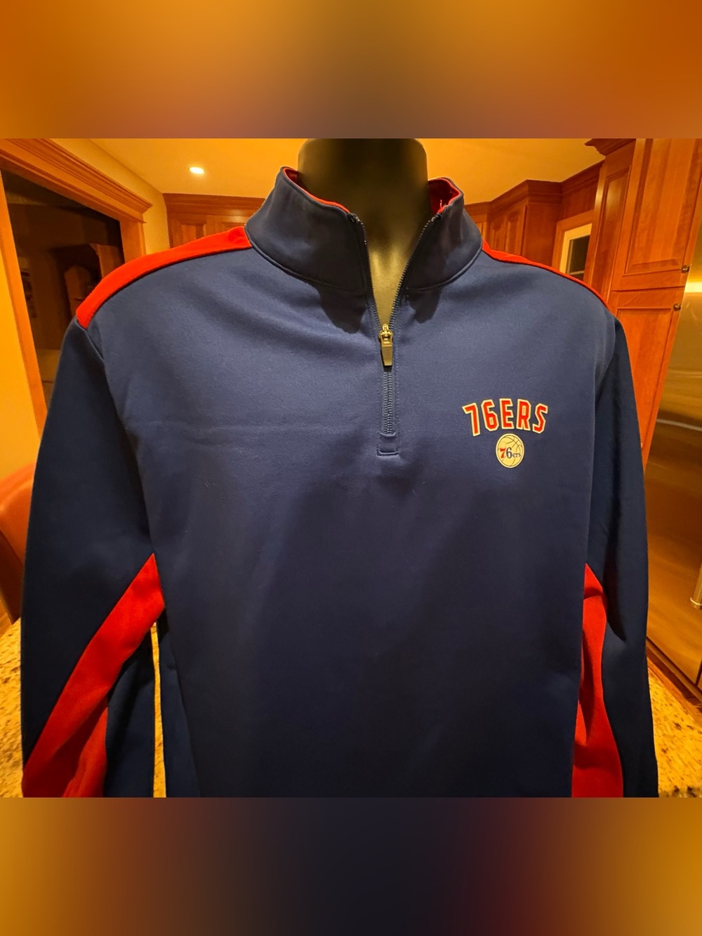 Philadelphia 76ers men’s quarter zip pullover. Sharp blue/red w/NBA logo. Large